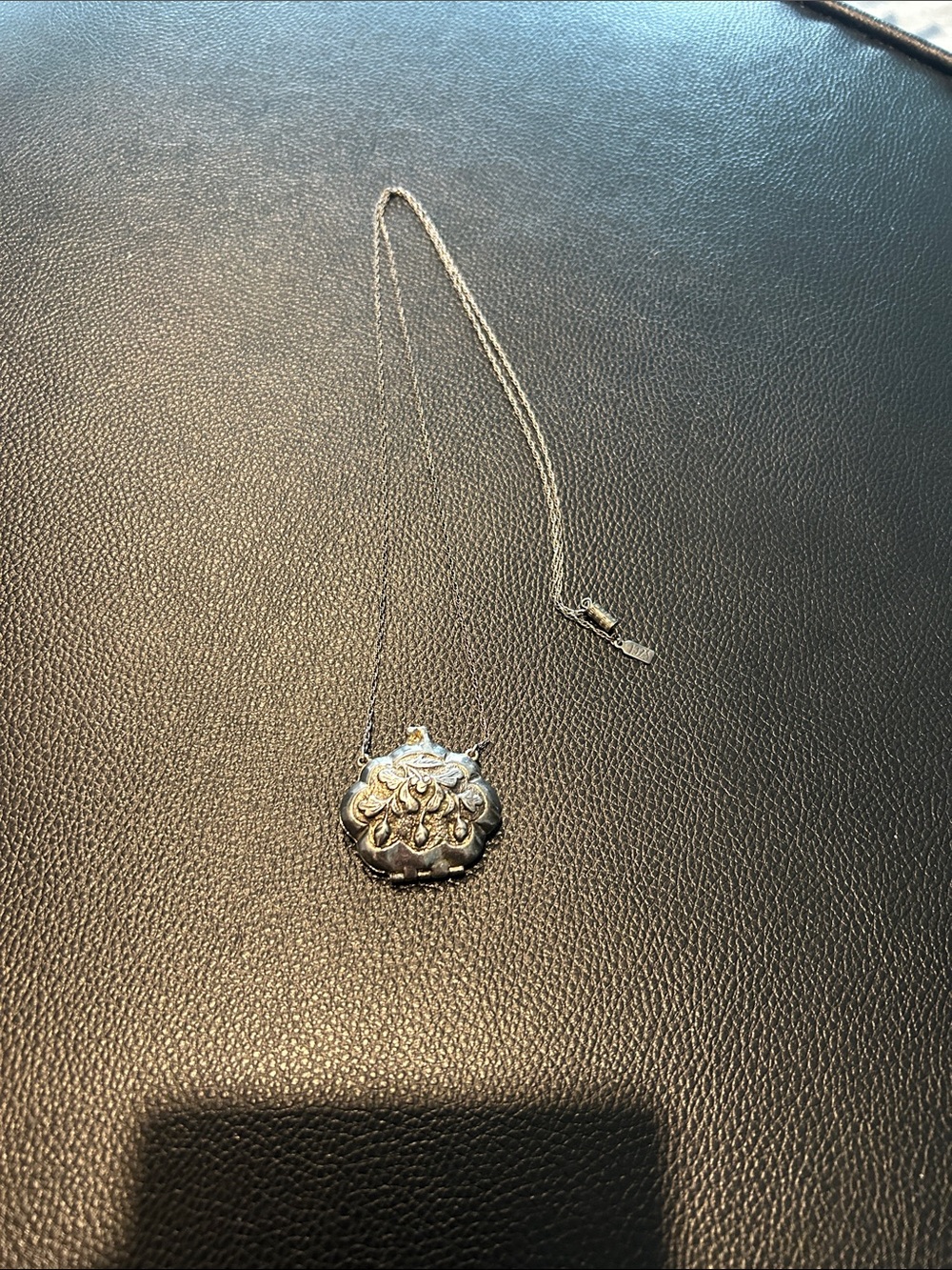 1928 Silver toned Floral Locket Style Pendant Necklace
